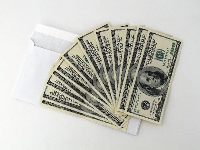 envelope with money of hundred dollar bills