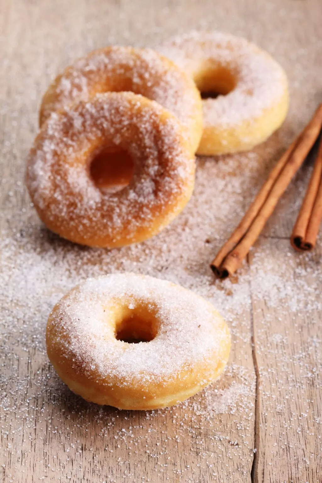 cinnamon sugar donuts on a table