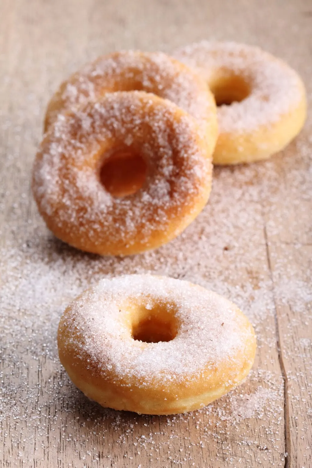 canned biscuit donuts covered in cinnamon and sugar