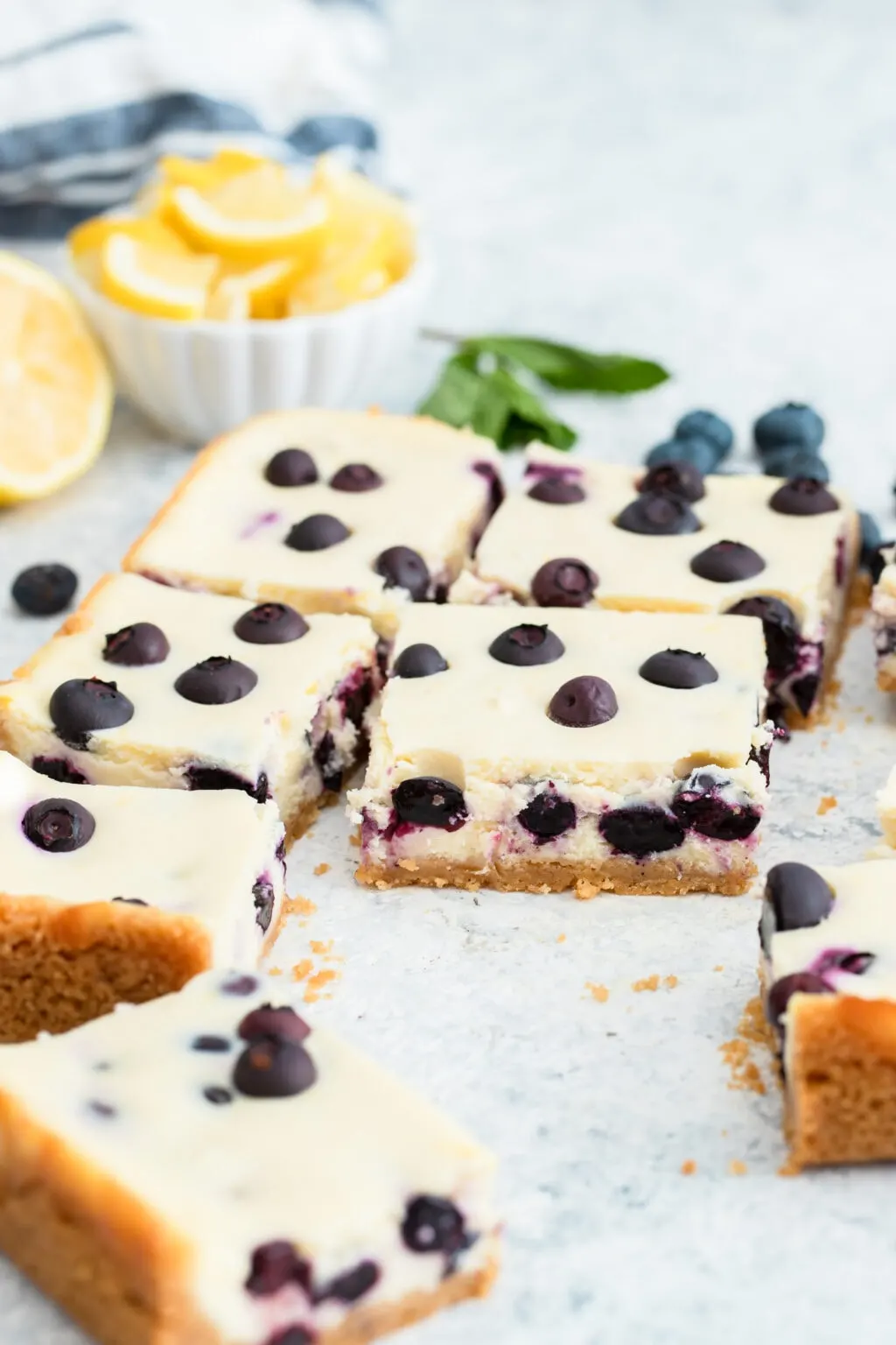 close up of lemon blueberry cheesecake bars