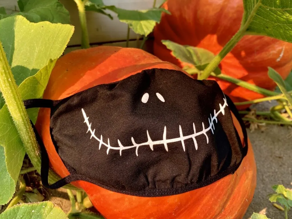jack skellington face mask on a pumpkin