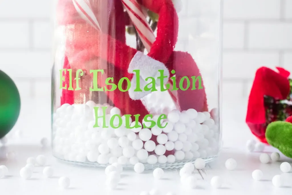 jar with words that say elf isolation house