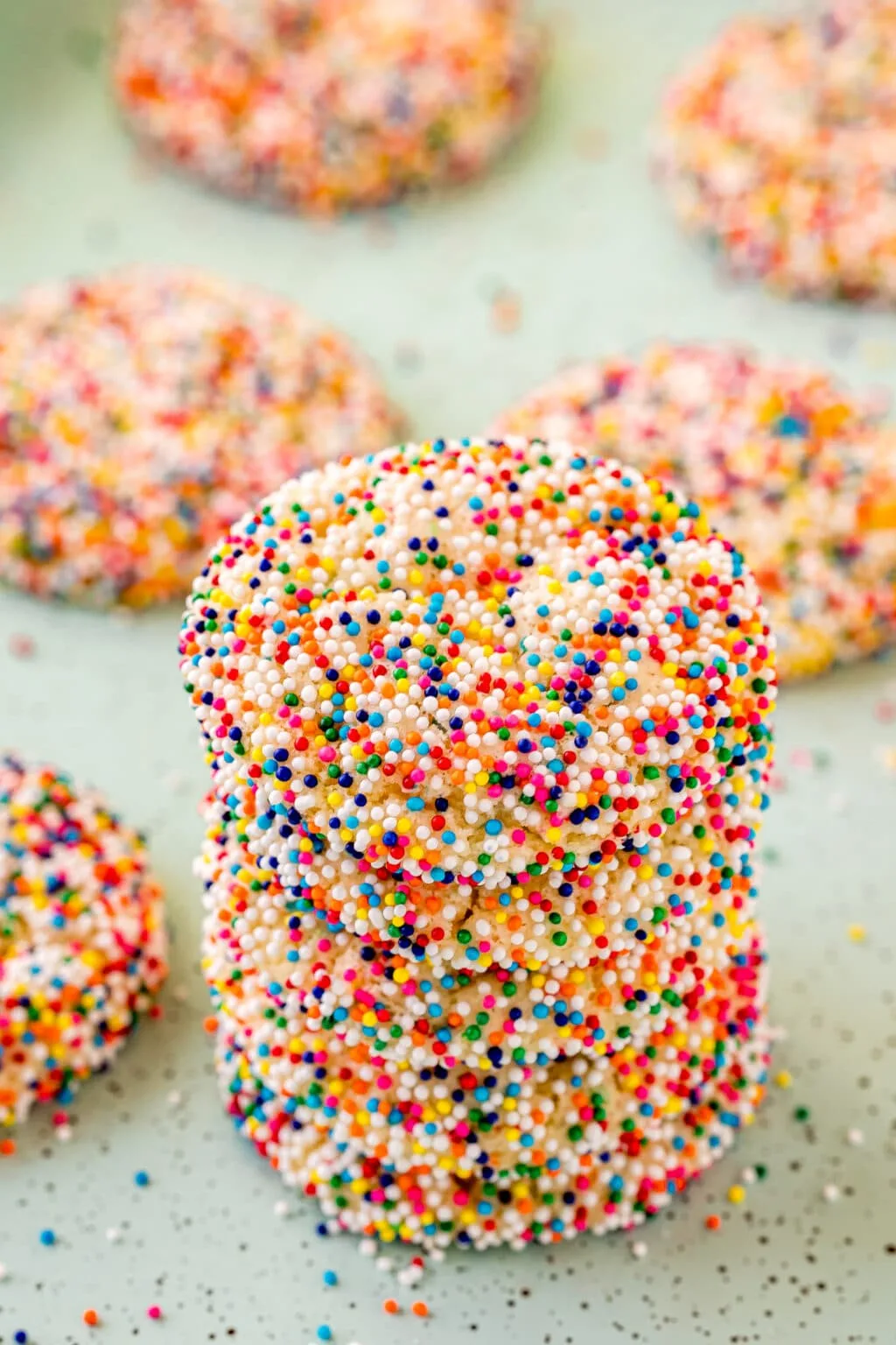 funfetti cake mix cookies stacked on table