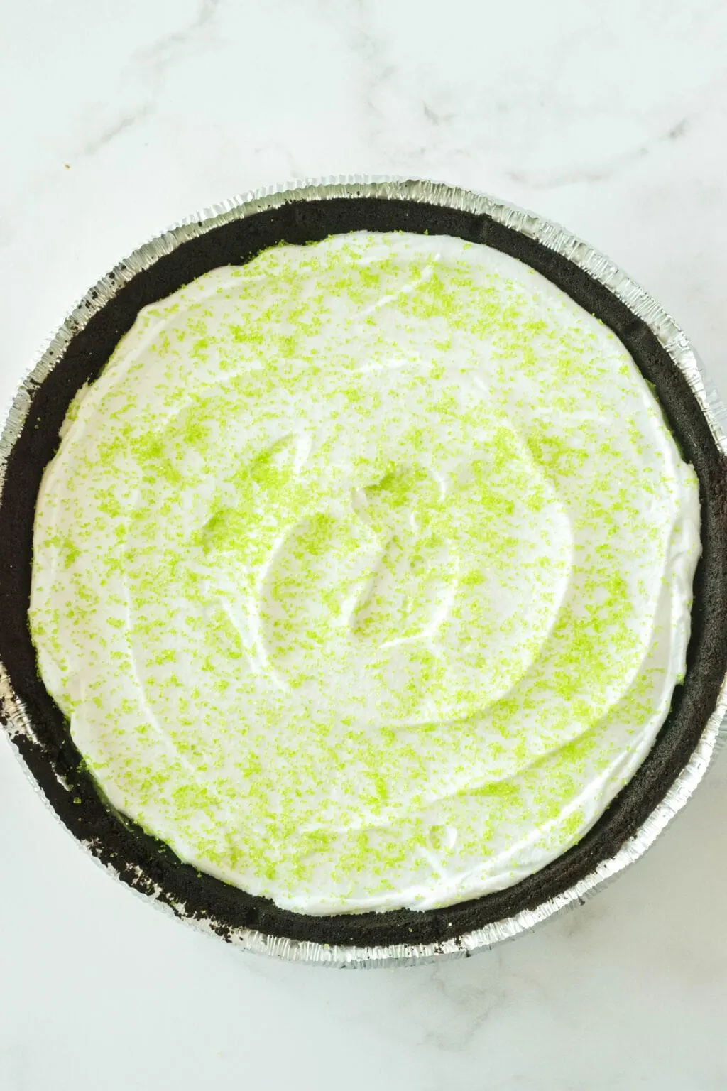 green sprinkles on top of cool whip