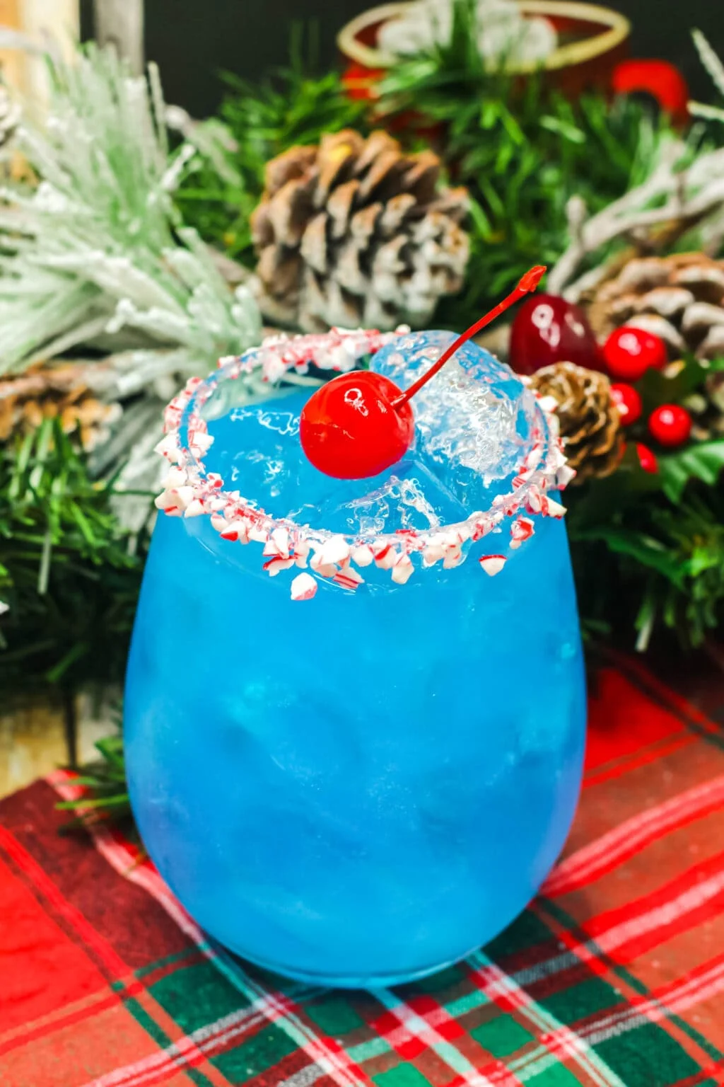 blue frosty cocktail in a glass with ice