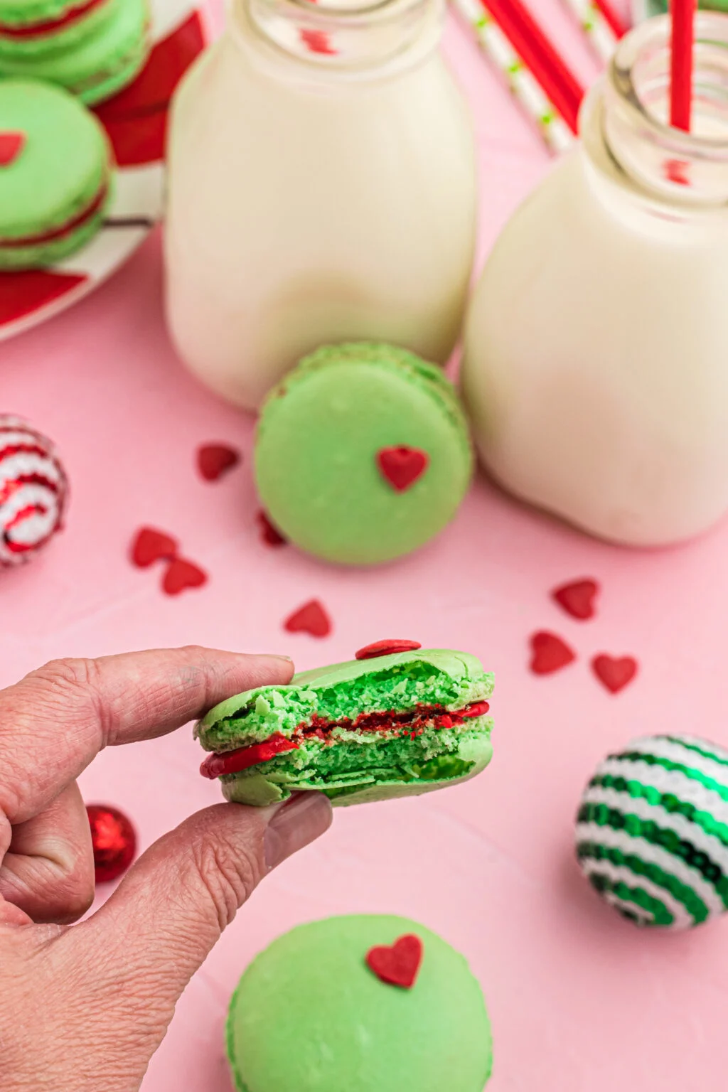 grinch macarons with bite taken out