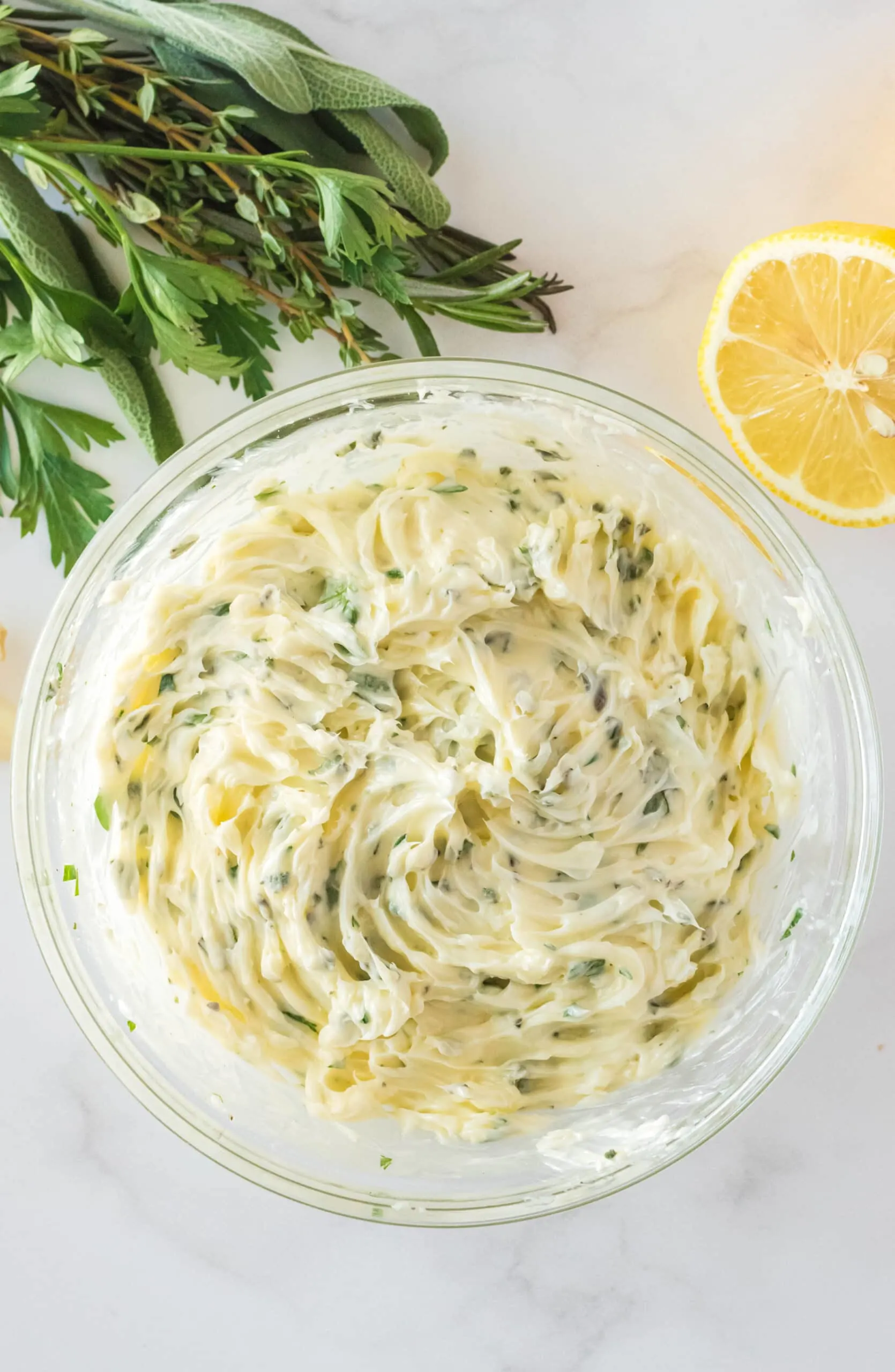 garlic herb butter ingredients mixed in bowl