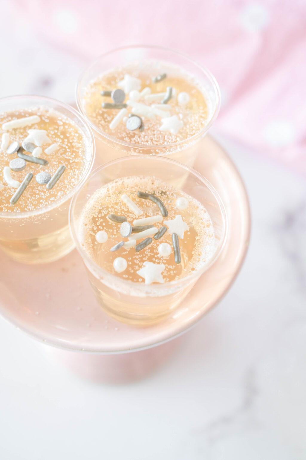 champagne jello shots on serving tray