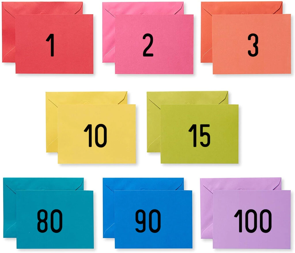 colorful envelopes numbered 1-100 for the 100 envelope challenge 