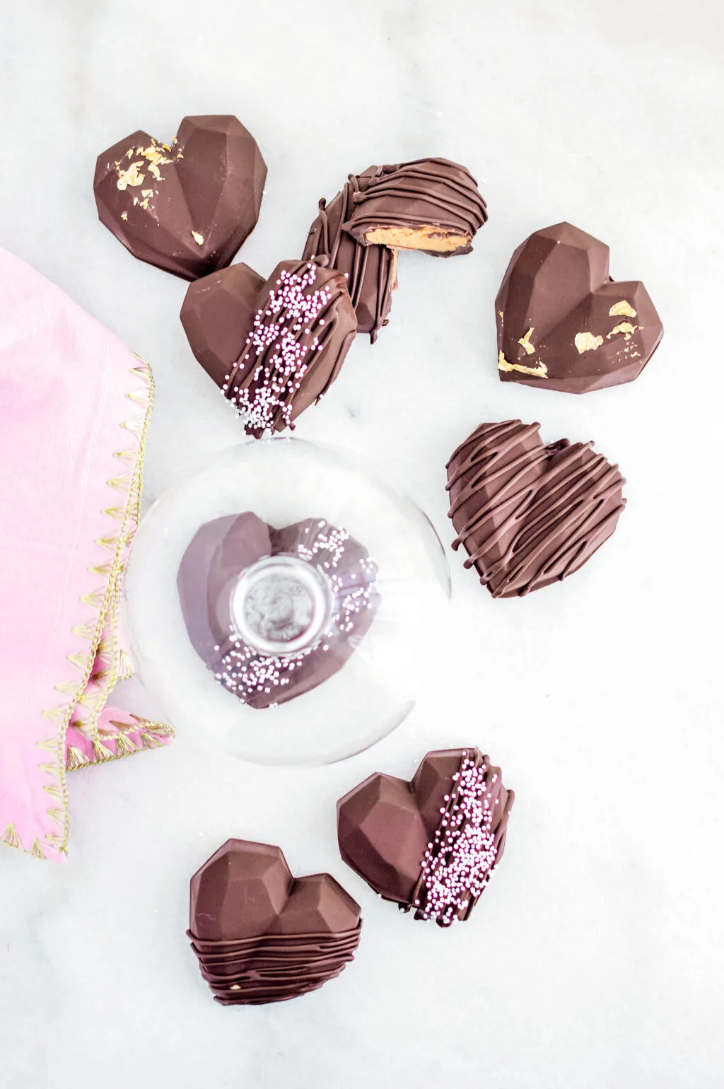 chocolate peanut butter hearts stacked on table