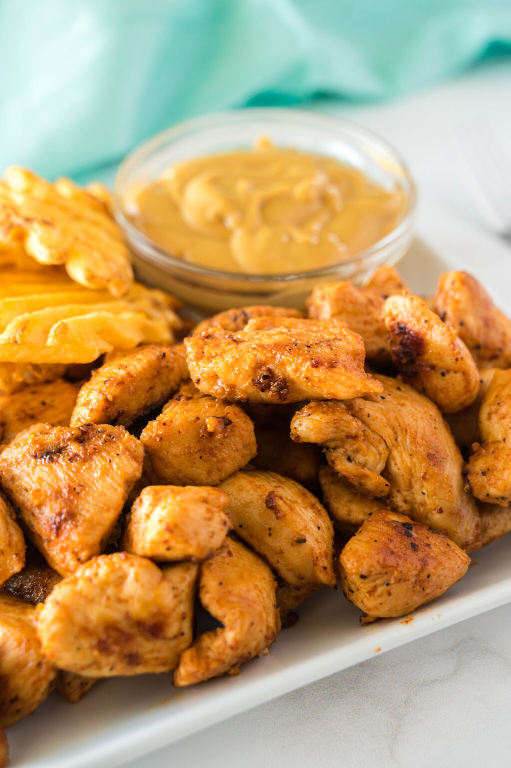 chick-fil-a grilled nuggets on a plate with chickfila sauce