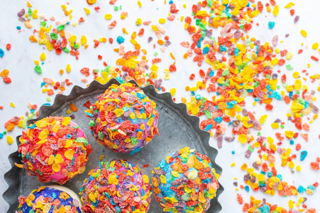 fruity pebbles hot cocoa bombs on table
