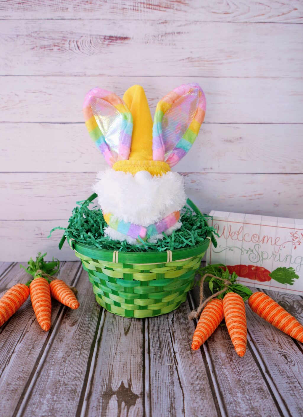 Rainbow bunny gnome made from dollar tree supplies. Finished Easter gnome in an Easter basket.