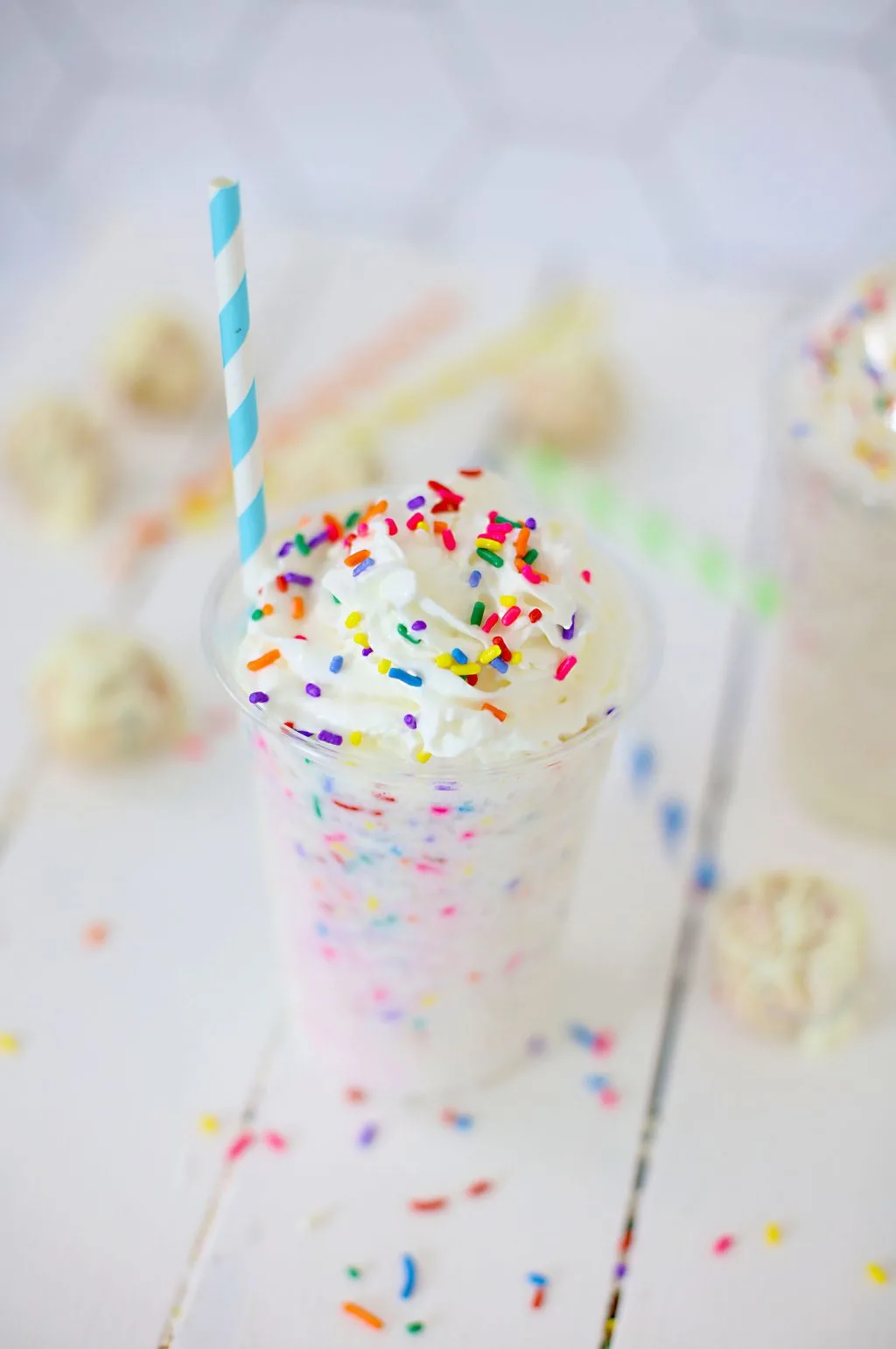 copycat starbucks birthday cake frappuccino in clear cup with straw