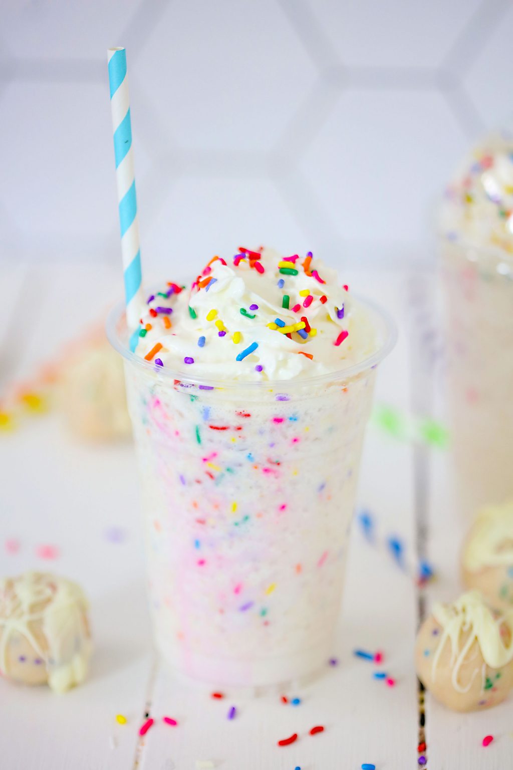 copycat starbucks birthday cake frappuccino in clear cup with straw