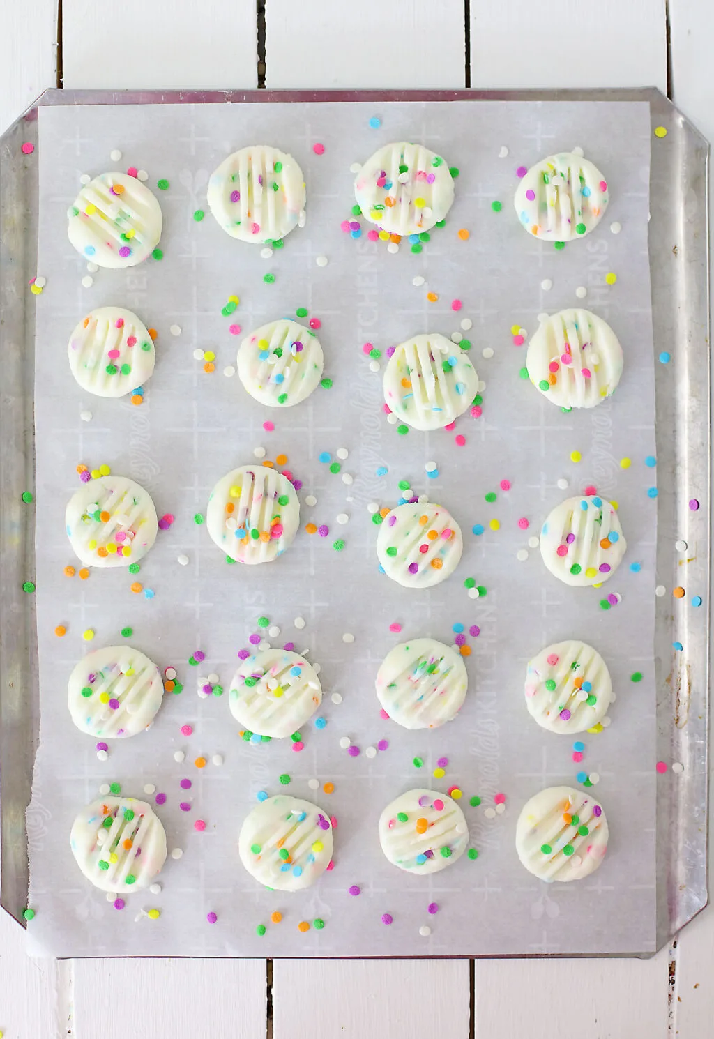 funfetti cream cheese mints on cookie sheet