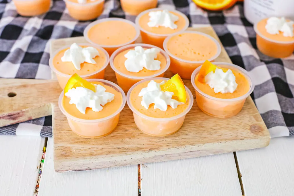 orange creamsicle jello shots on table