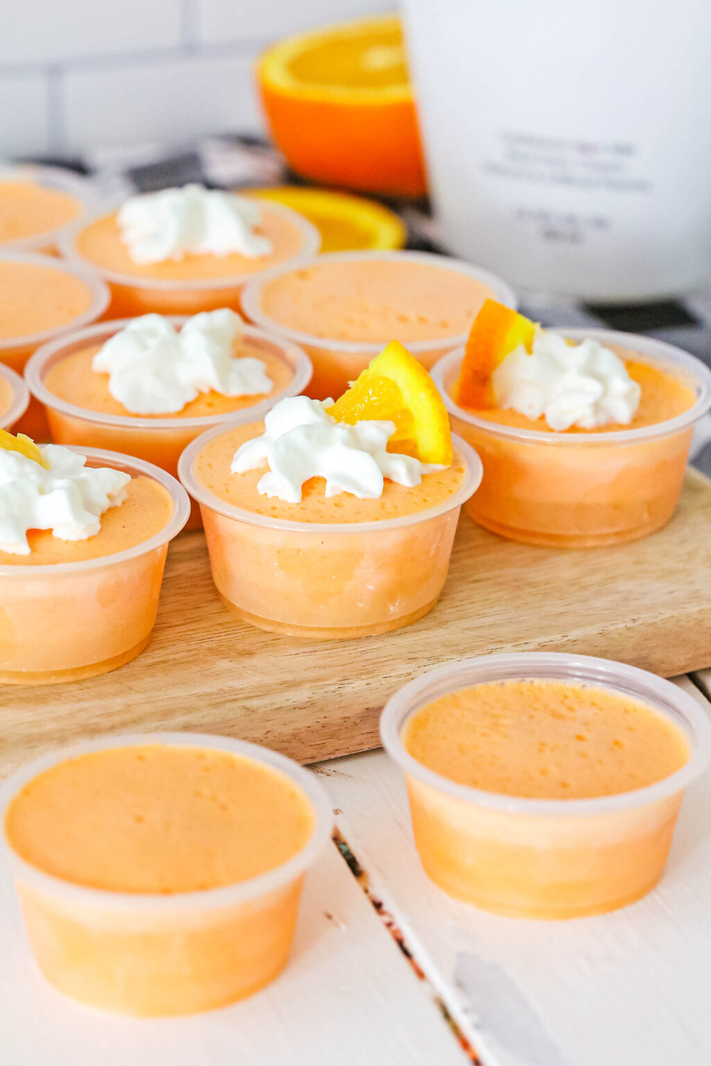 orange creamsicle jello shots on table