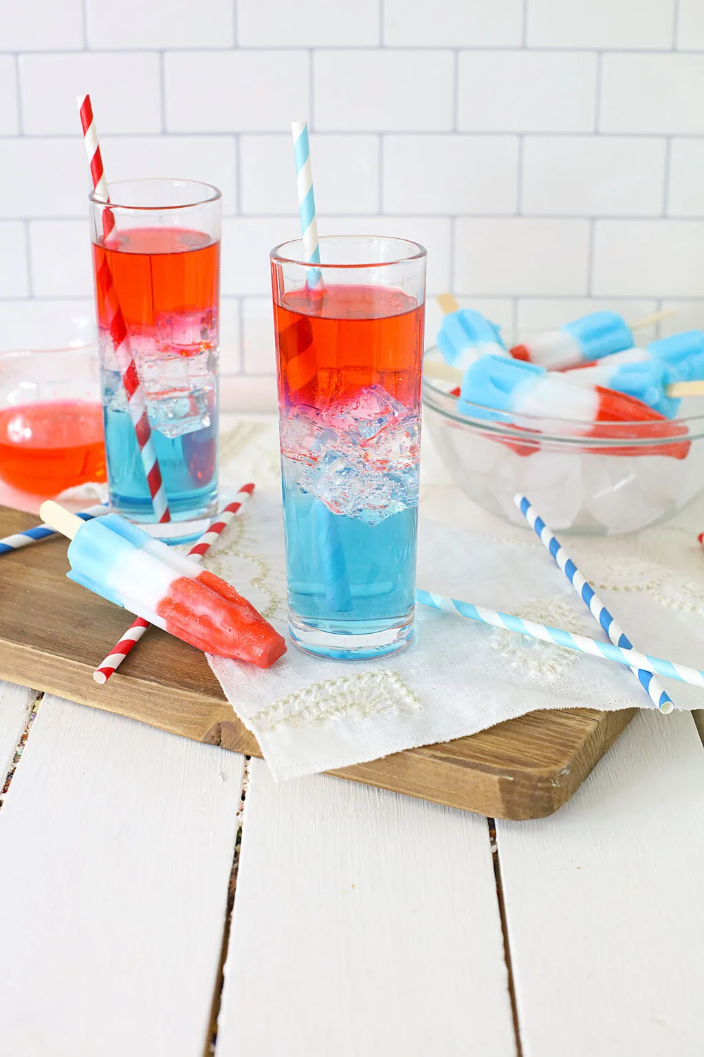 layered bomb pop cocktail in clear glass
