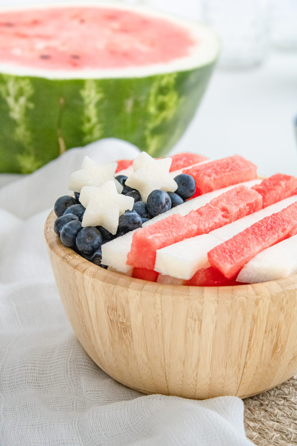 4th of july fruit salad in wooden bowl
