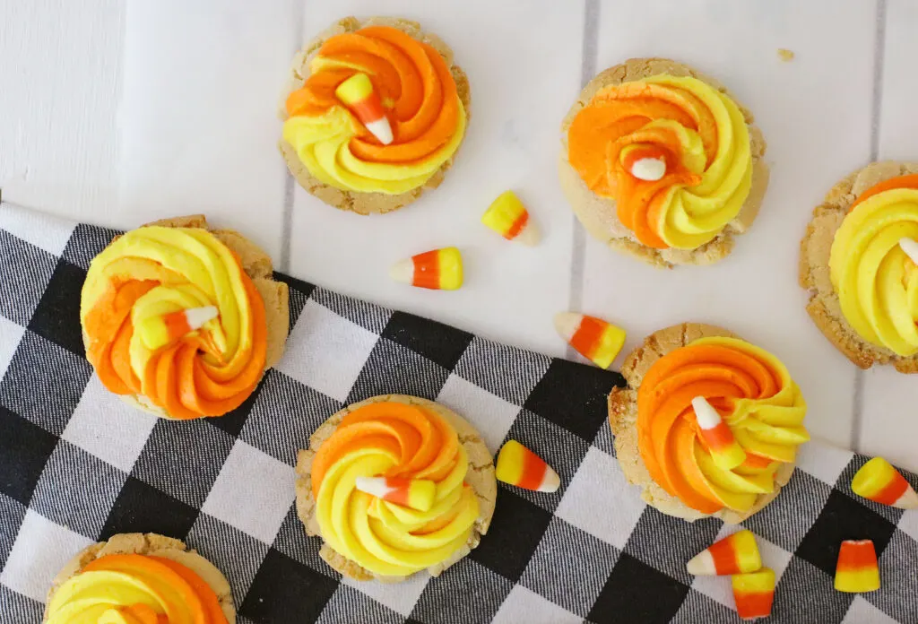 candy corn cookies on a white table