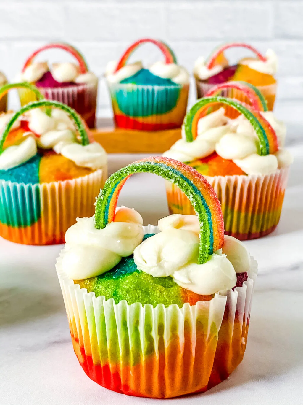 easy rainbow cupcakes on table