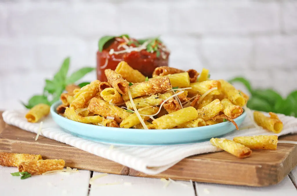 air fryer pasta chips on a blue plate