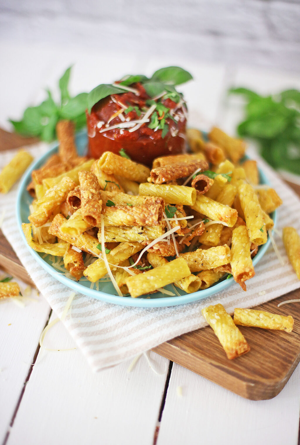 air fryer pasta chips on a blue plate