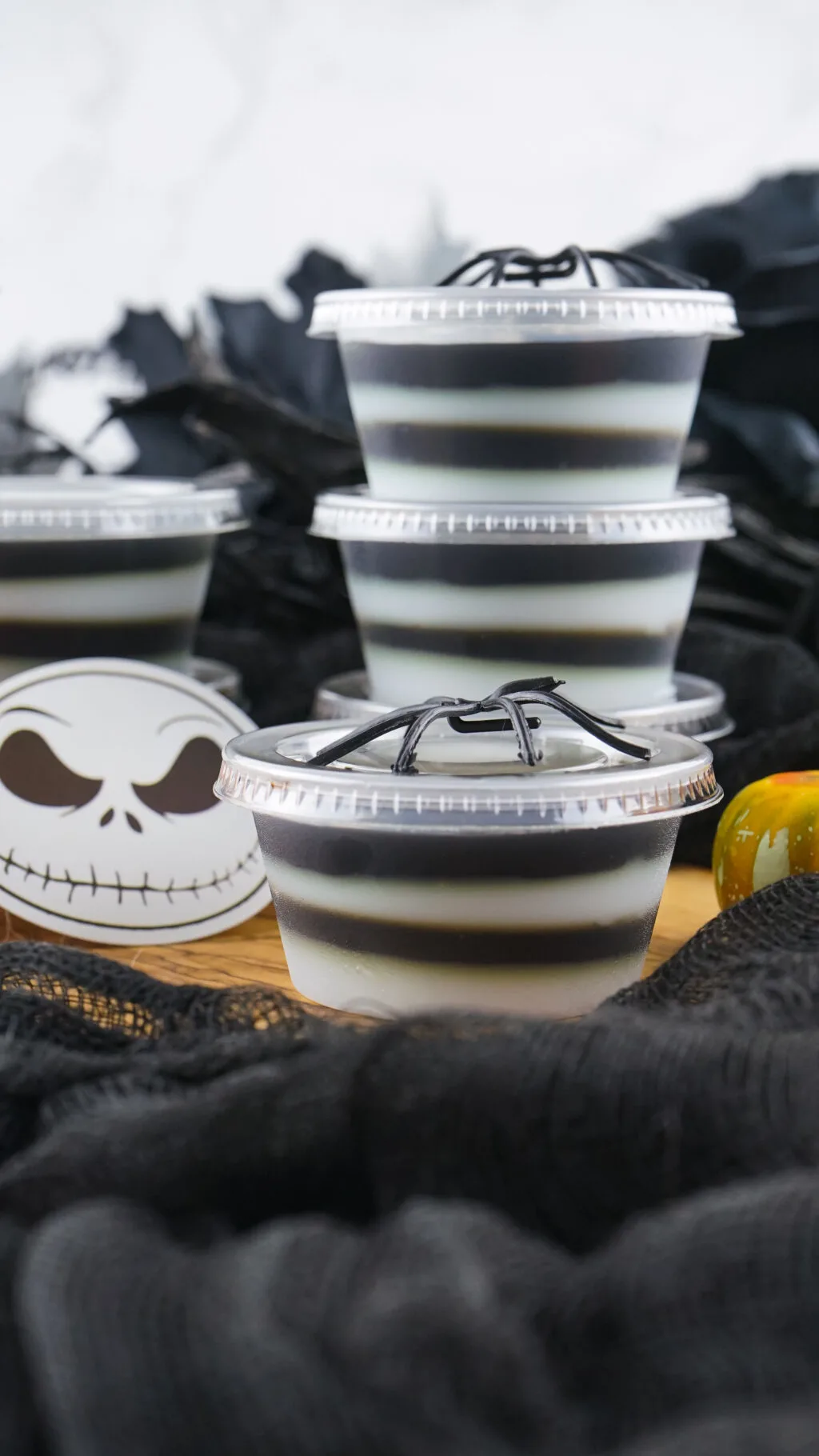 jack skellington jello shots with lids on a table