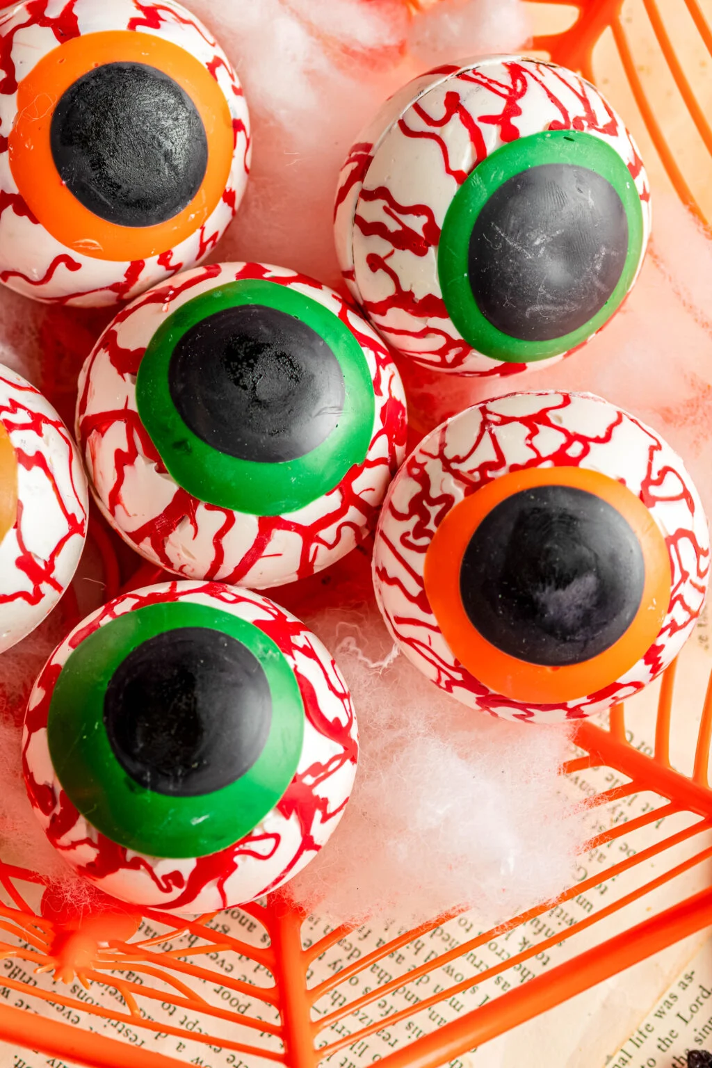 eyeball hot cocoa bombs in an orange container