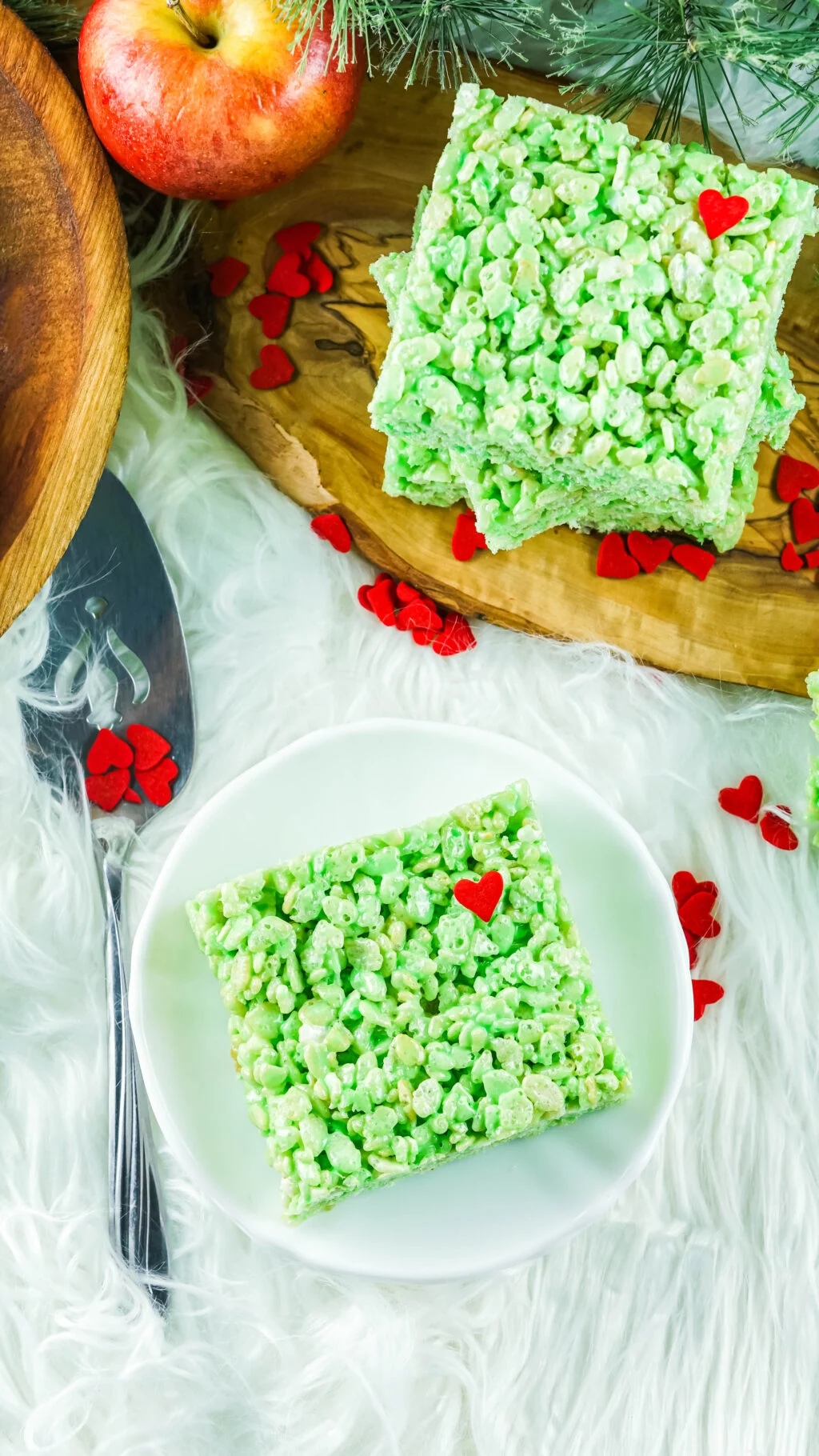 green grinch rice krispies treat on white plate