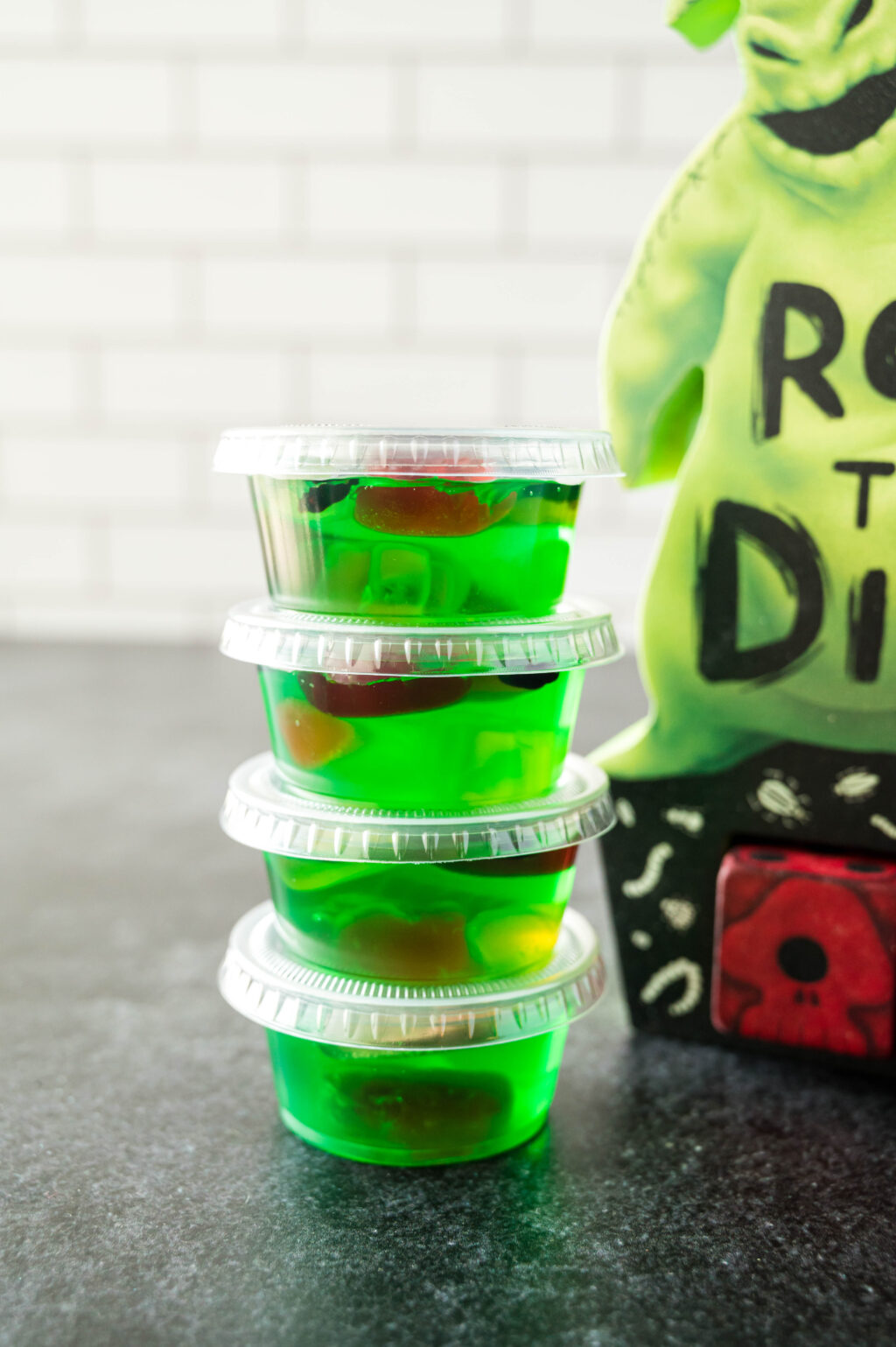 oogie boogie jello shots stacked on a table