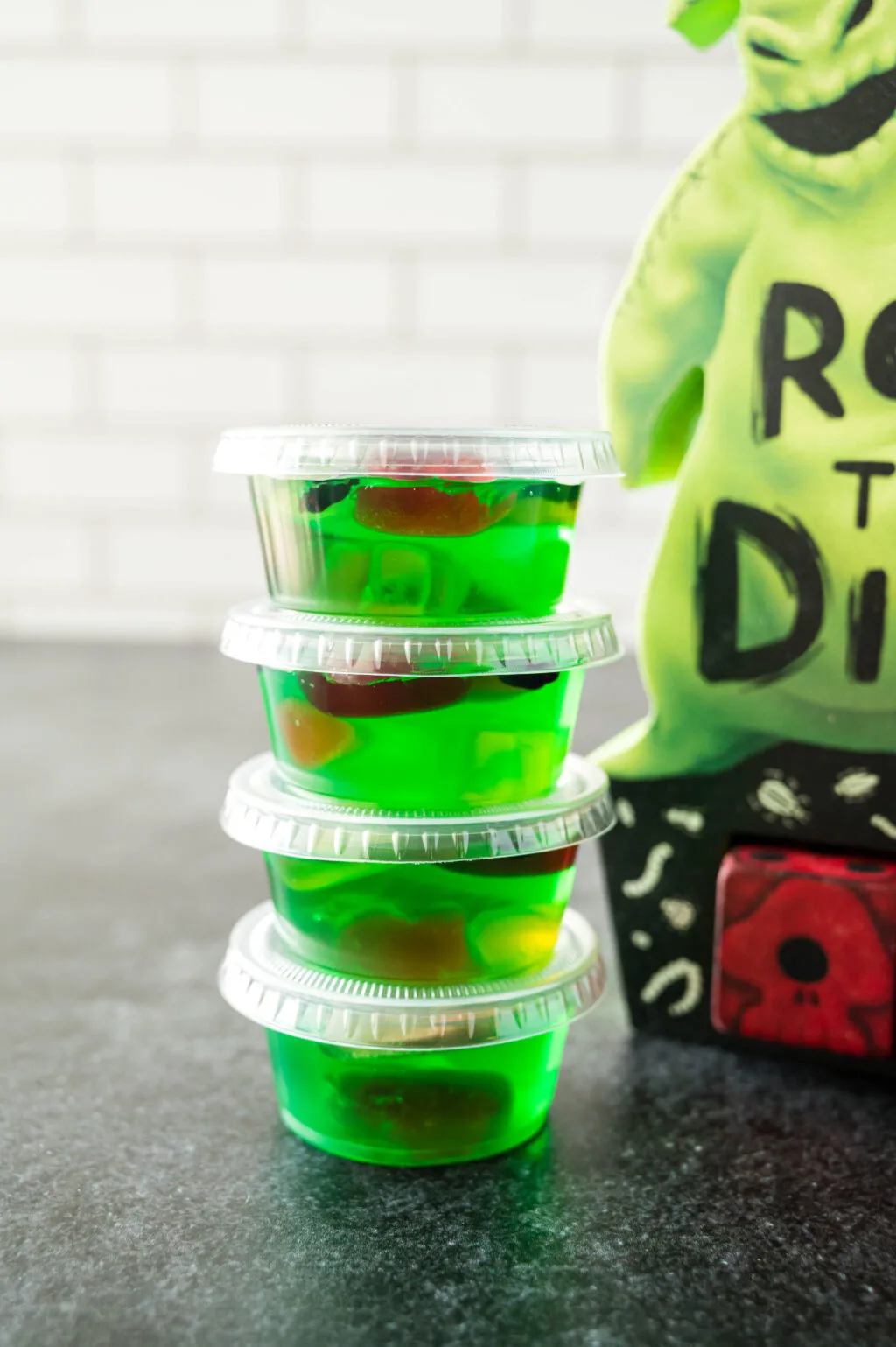 oogie boogie jello shots stacked on a table