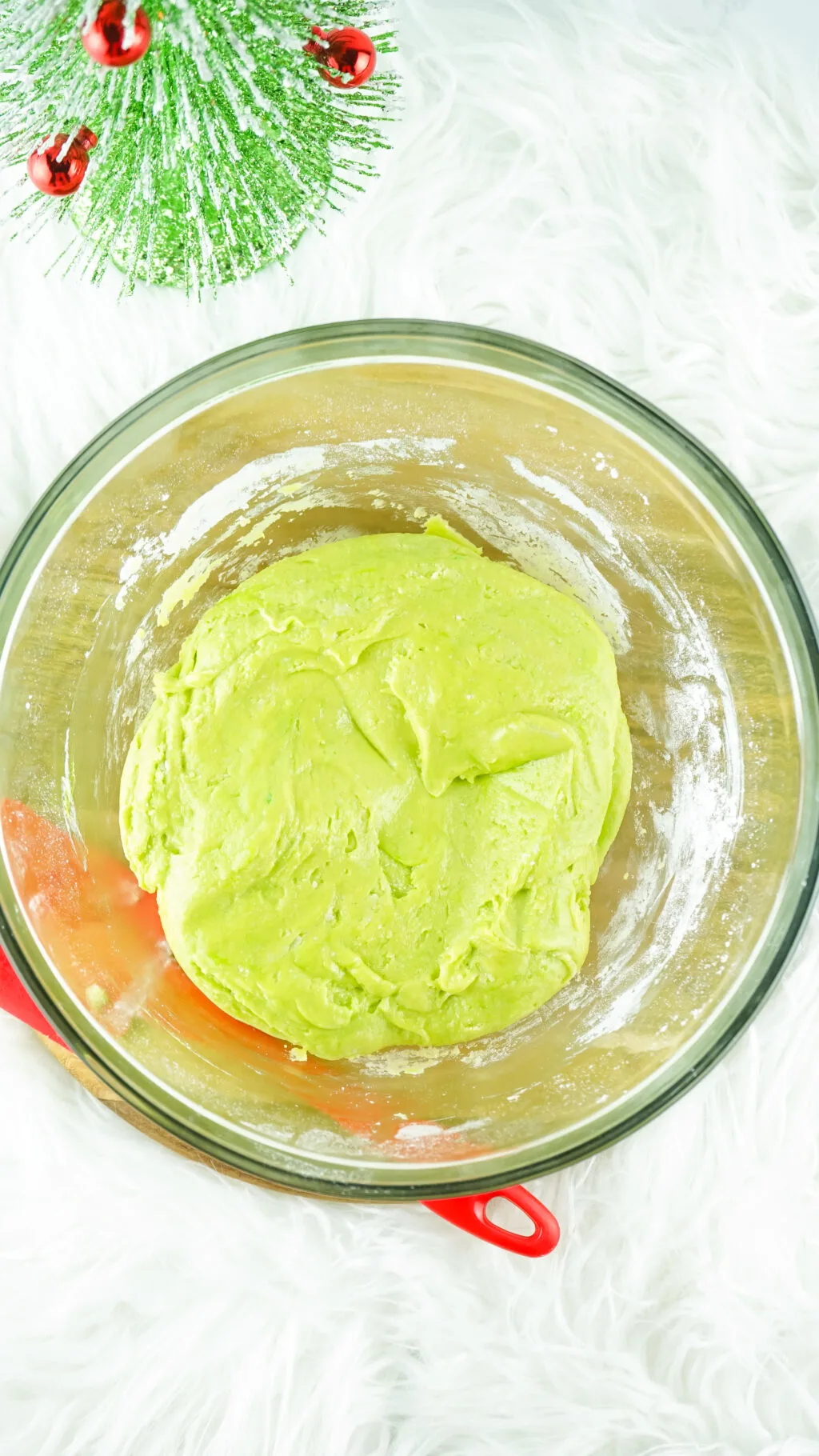 lime green cookie dough in a bowl