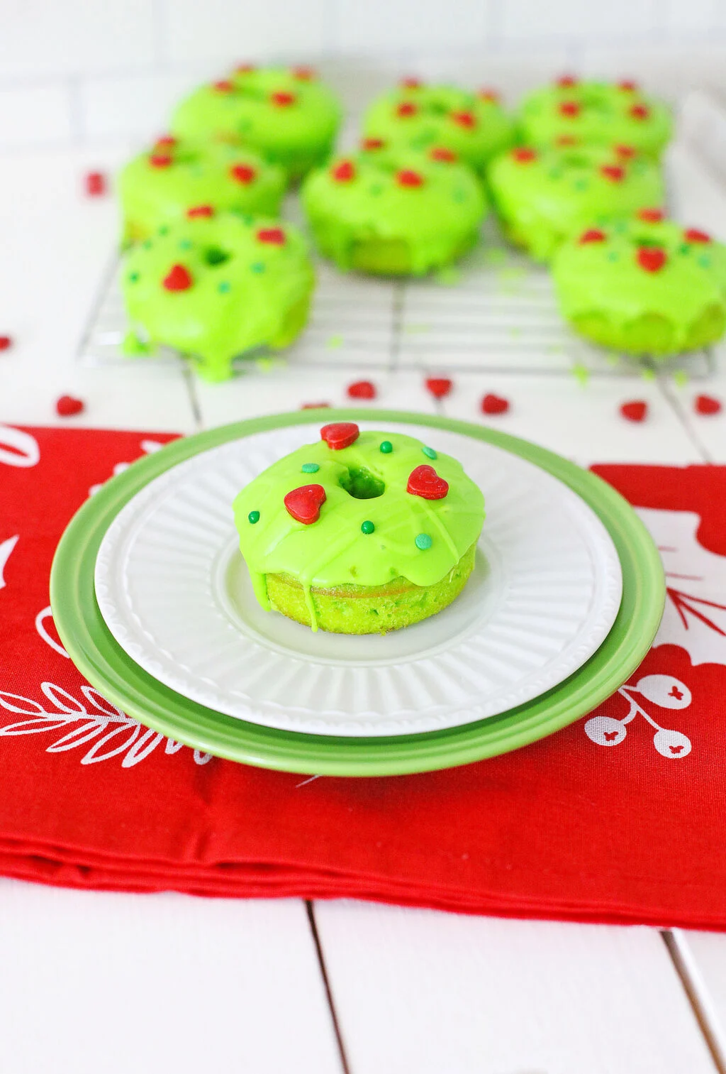 grinch donut decorated on white plate