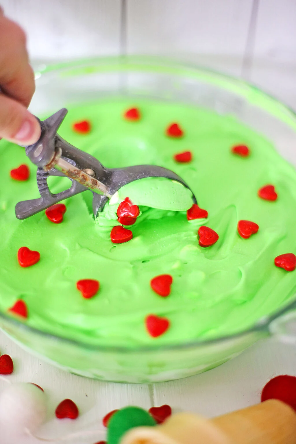 ice cream scooper scooping out grinch ice cream