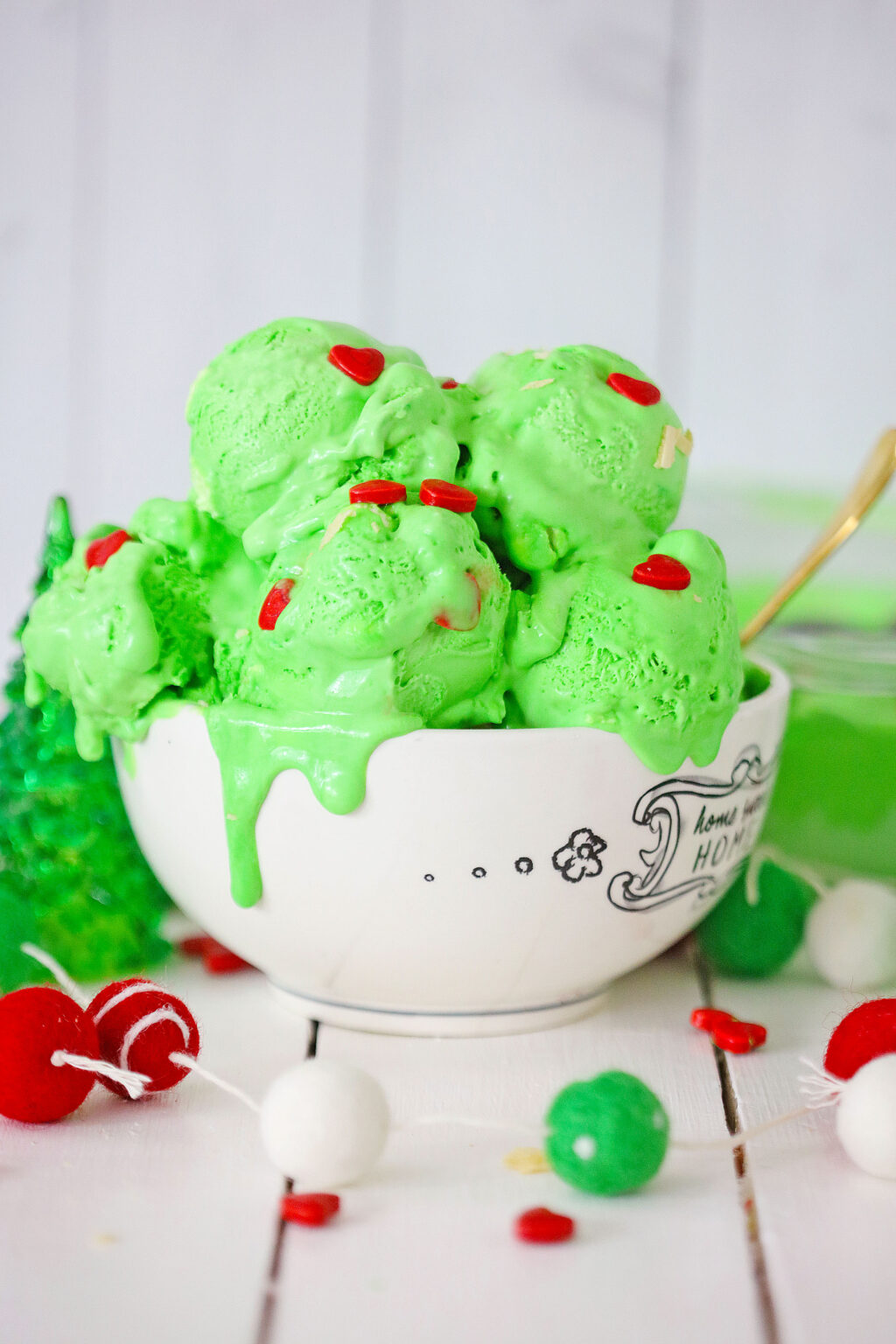 grinch ice cream in a white bowl