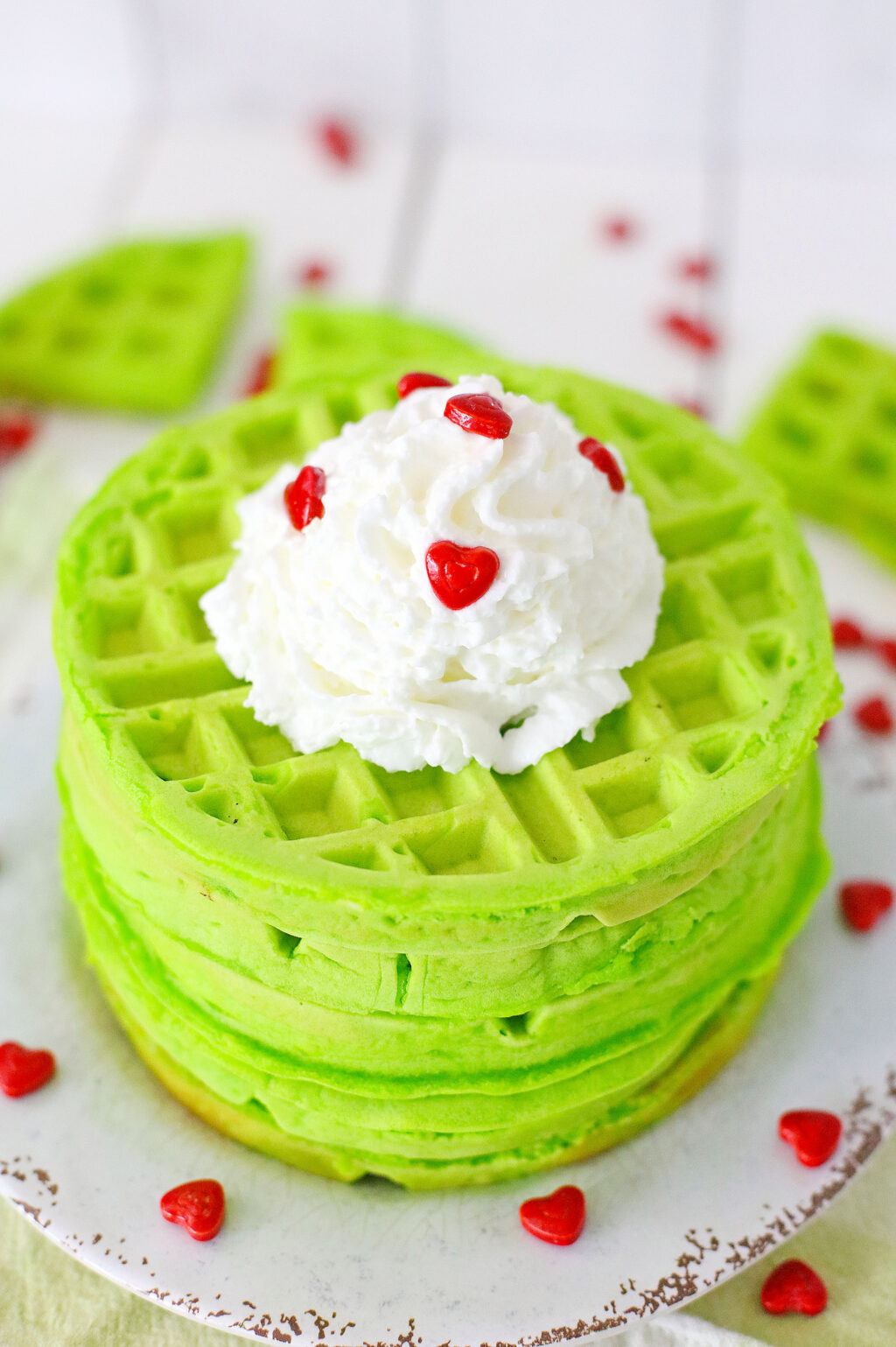 grinch waffles on a white plate
