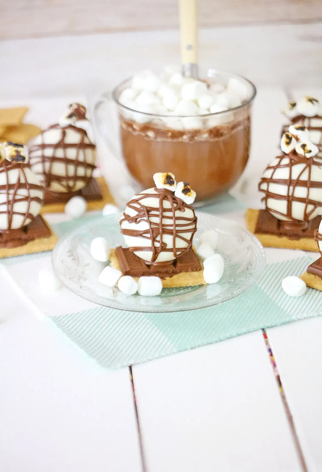 s'mores hot cocoa bombs on white table