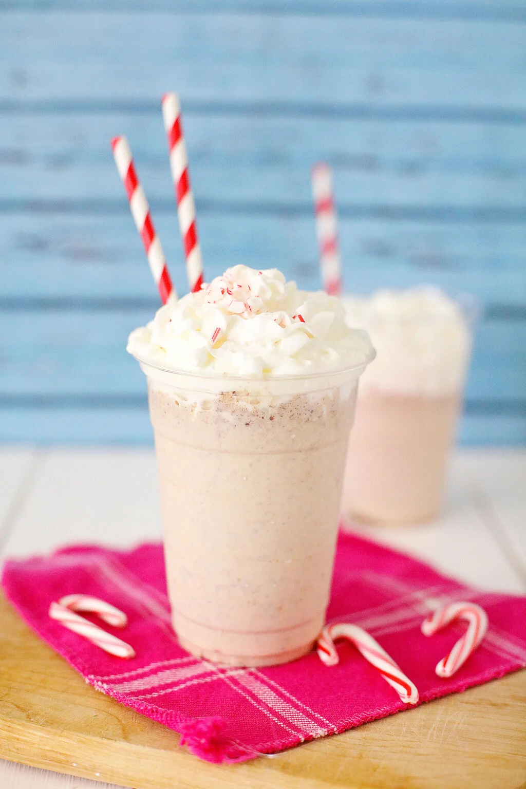 Copycat Chick-Fil-A Peppermint Shake in a clear cup with blue background
