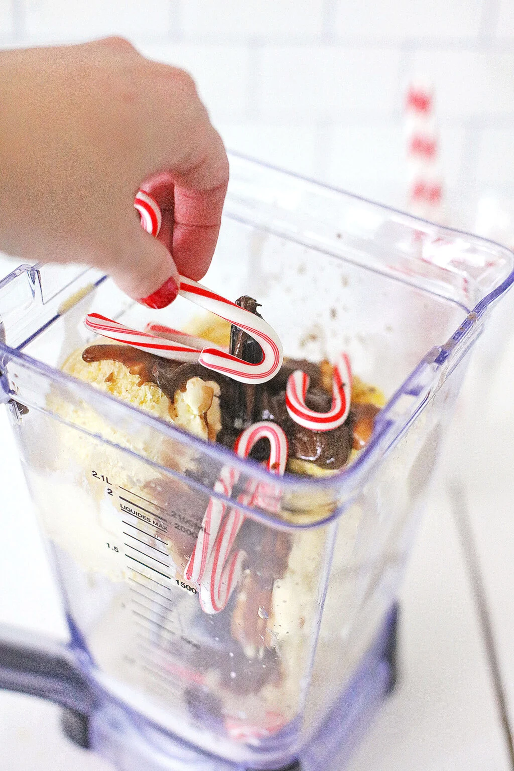 mini candy canes being put into blender