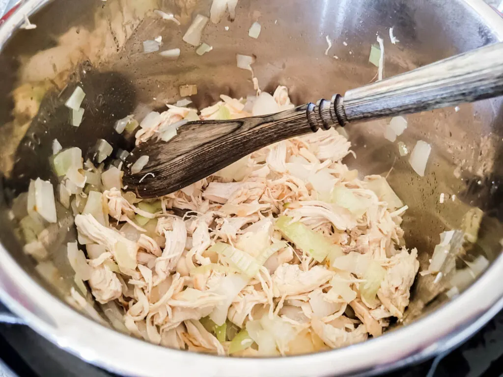 shredded chicken and onions in an instant pot