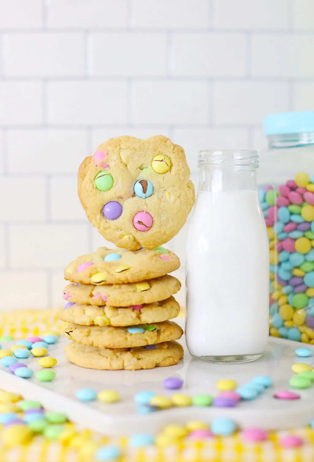 Easter M&M cookies stacked on a table