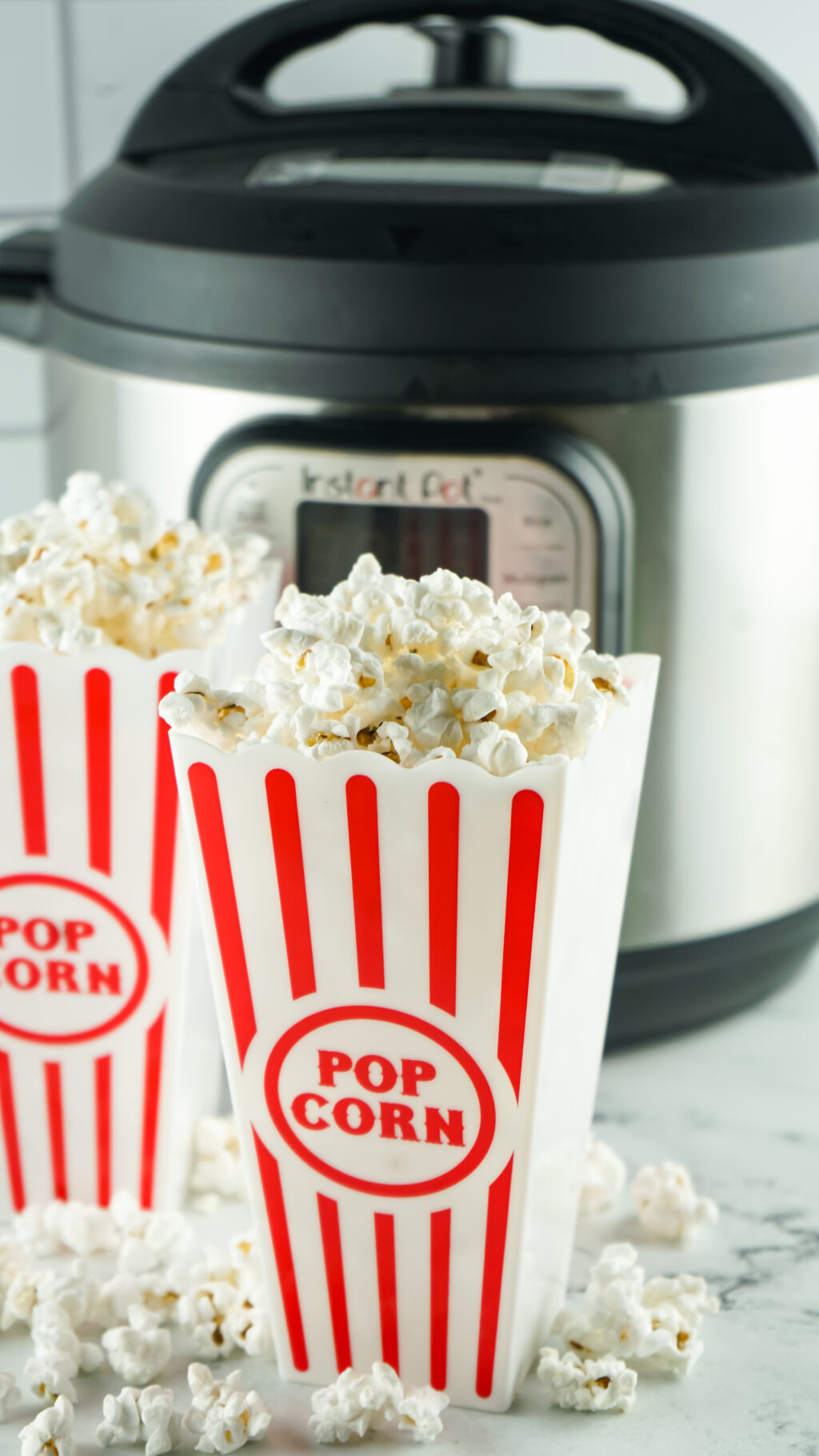 homemade popcorn made in the Instant Pot in a popcorn container