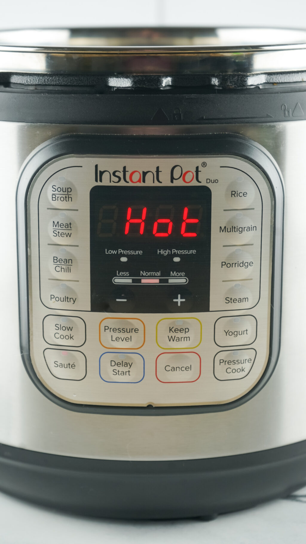 an instant pot that says "hot" on it