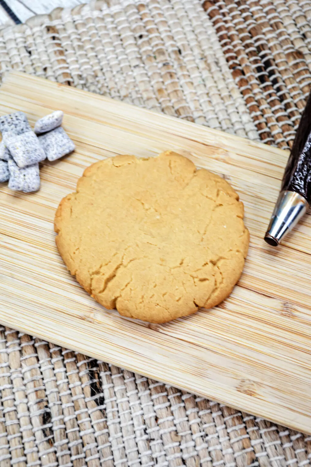 baked muddy buddy cookie on a cutting board