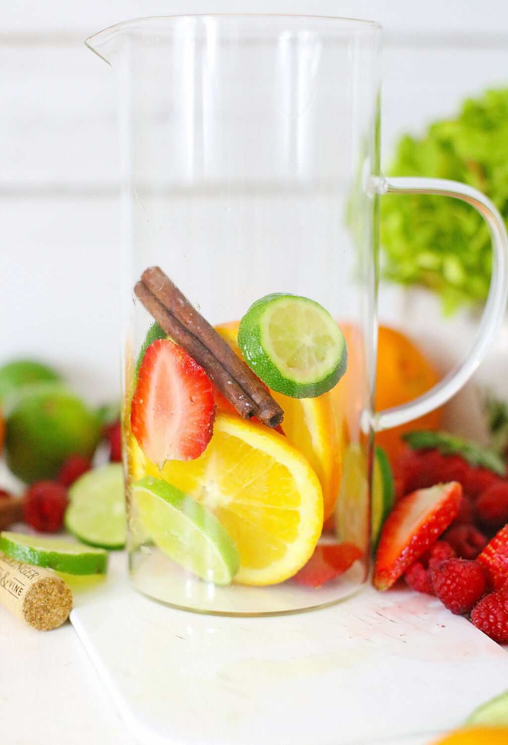 fruits in glass pitcher