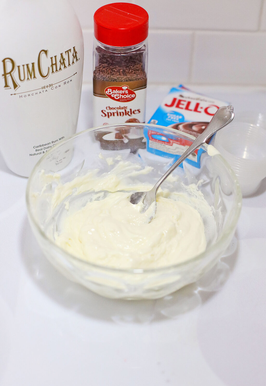 whipped cream cheese in clear bowl