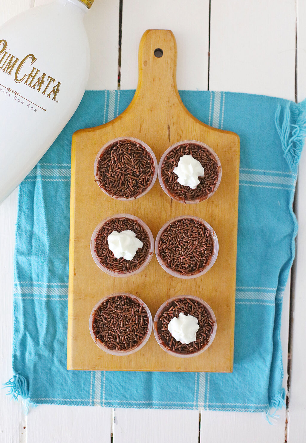 chocolate pudding shots on a cutting board