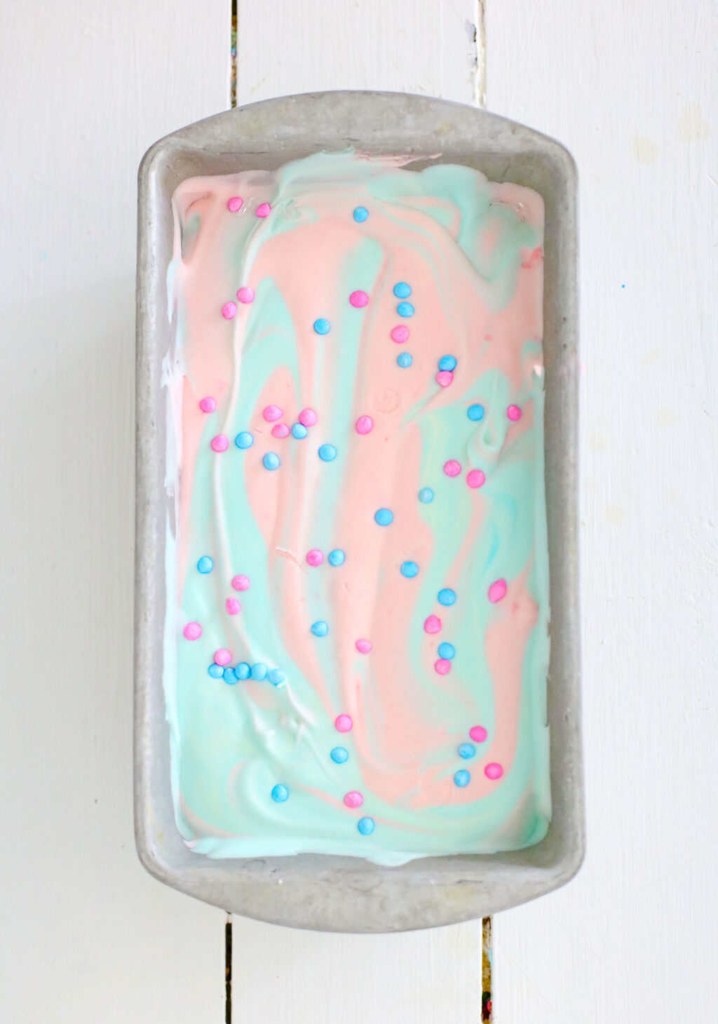 cotton candy ice cream mixture in loaf pan